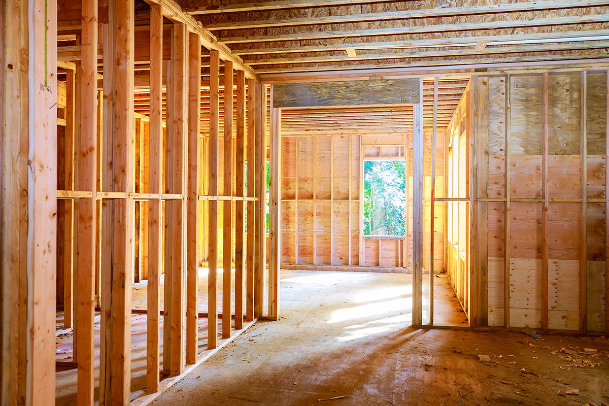 New house under construction framing against